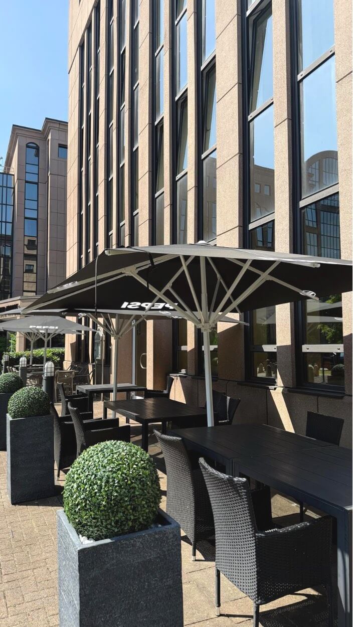 Outdoor terrace seating at the hotel in Ratingen.
